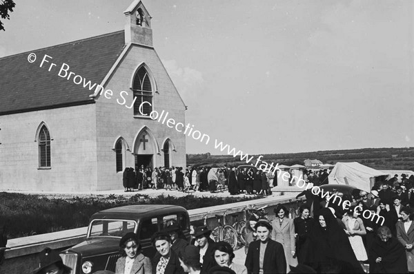 AFTER WOMENS CLOSING MEN KNEELING OUTSIDE CHURCH